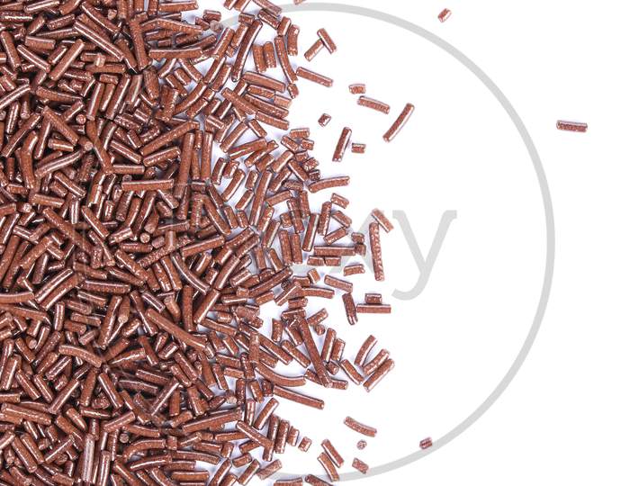 Close Up Of Chocolate Sprinkles. Vertical. Whole Background.