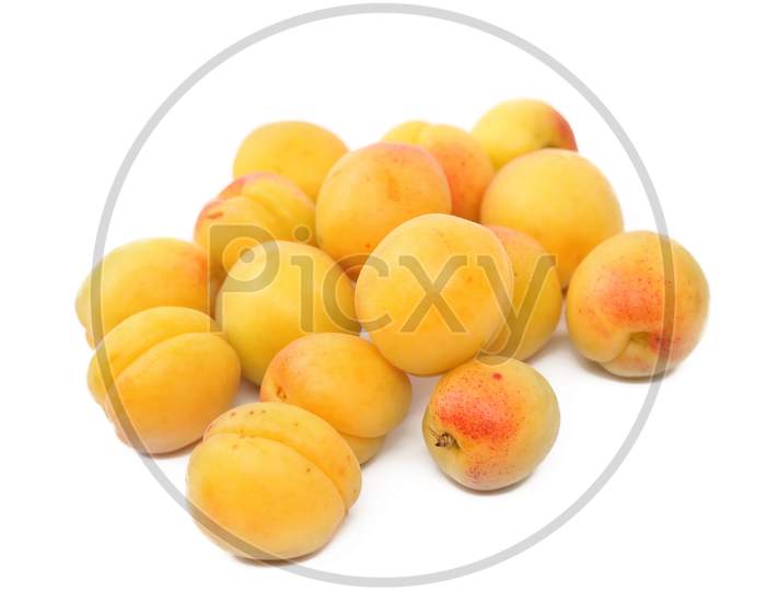 Bunch Of Ripe Apricots. Isolated On A White Background.