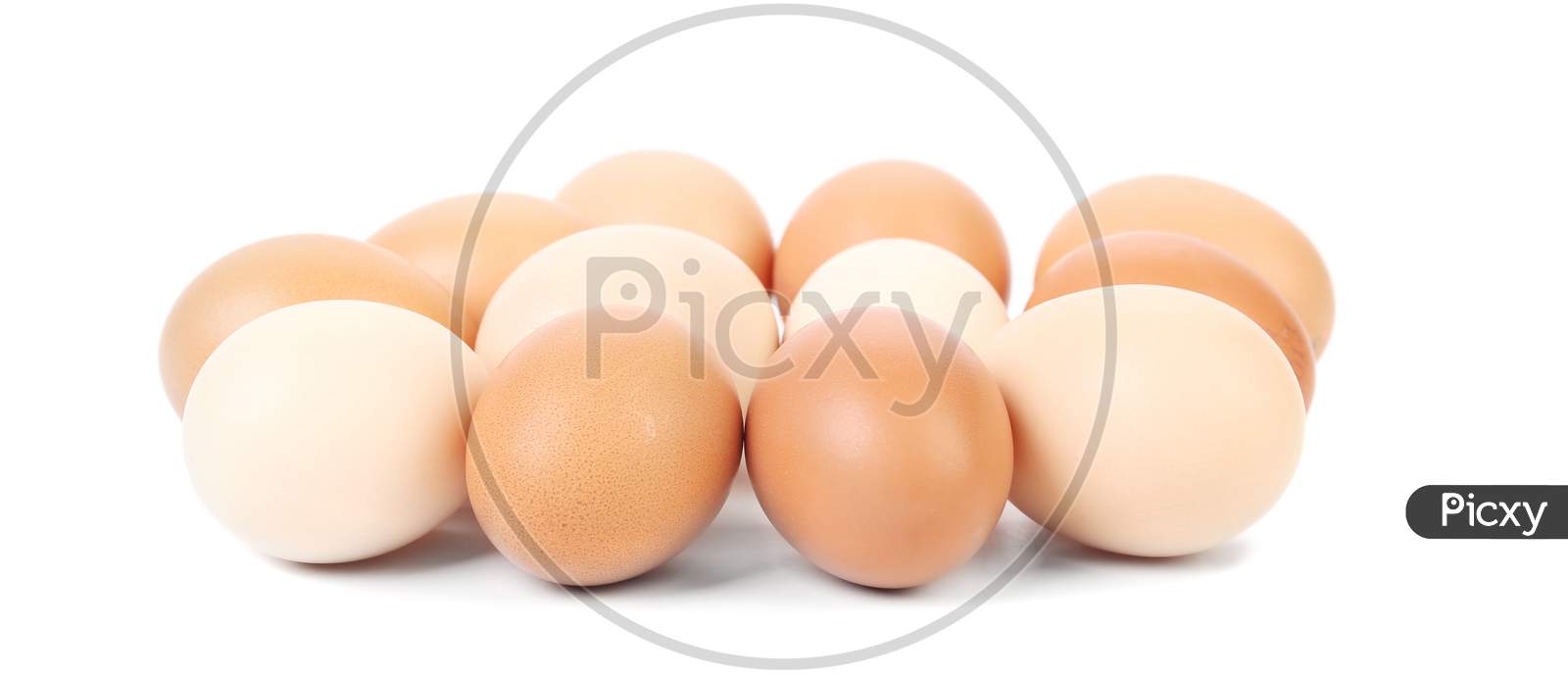 Brown And White Eggs. Isolated On A White Background.