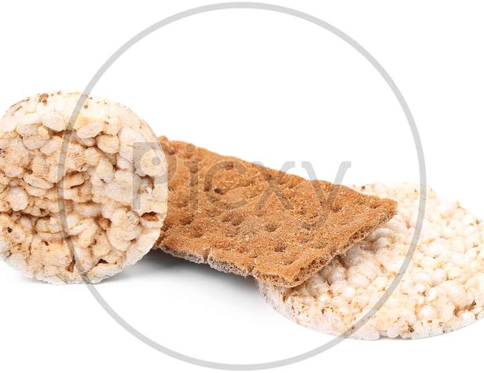Puffed Rice Snack And Grain Crisp Bread. Isolated On A White Background.
