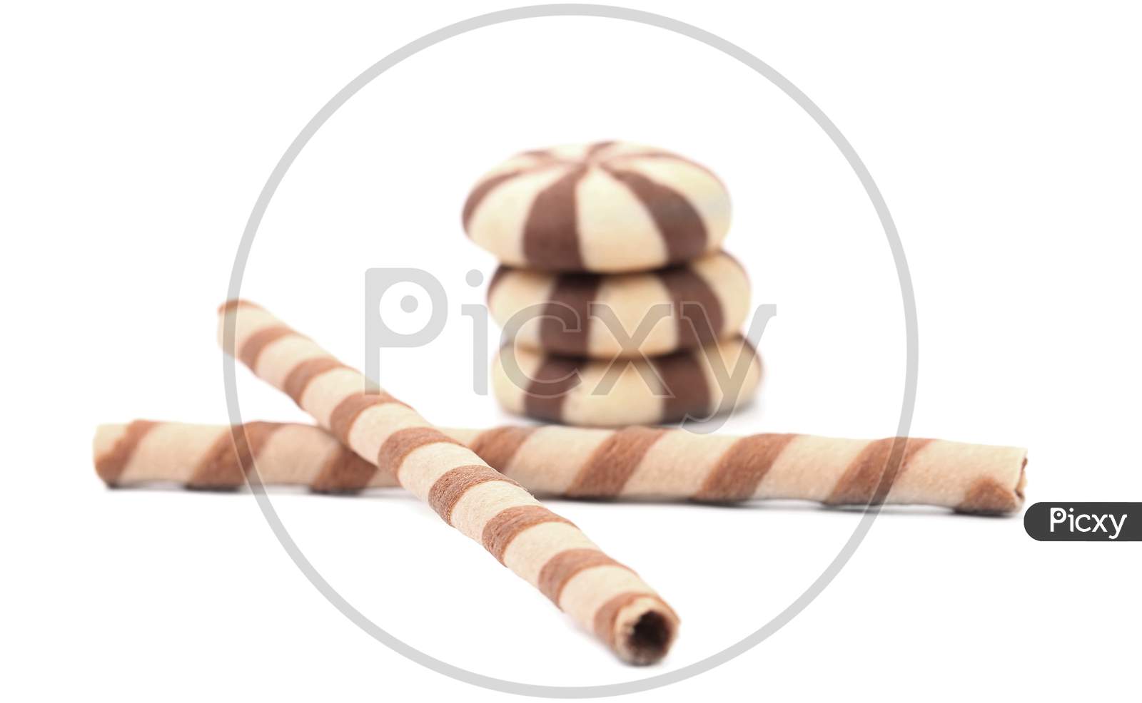 Striped Wafer Rolls And Stake Biscuits. Isolated On A White Background.