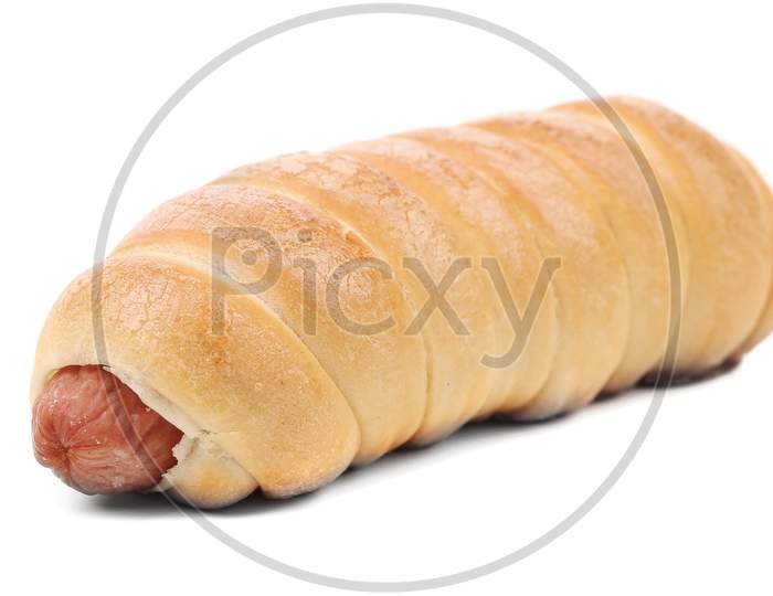 Close Up Of Baked Hot Dog. Isolated On White Background.