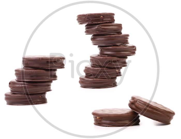 Stack Of Biscuit Sandwich With Chocolate. Isolated On A White Background.
