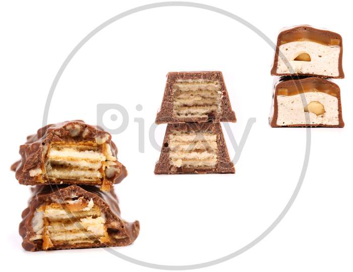 Collage Of Three Chocolate Stacks. Isolated On A White Background.