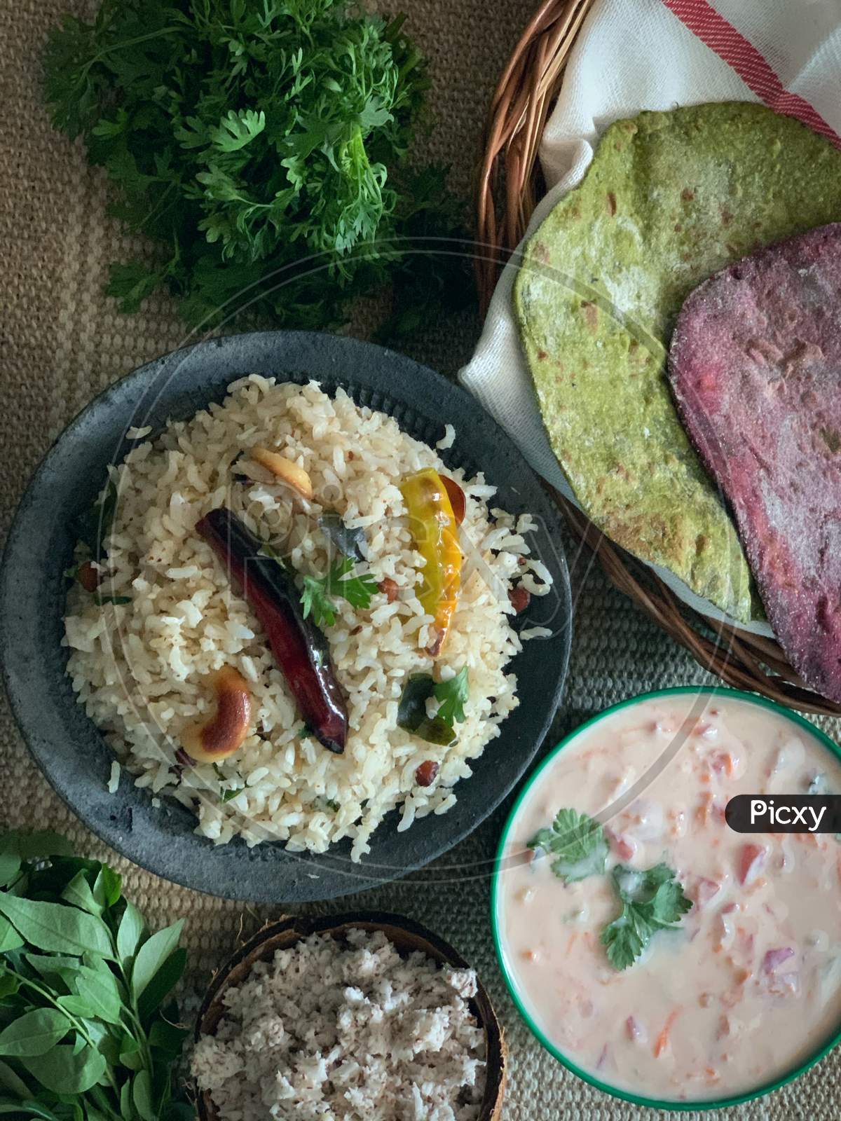 Coconut Rice and Vegetable Rotis