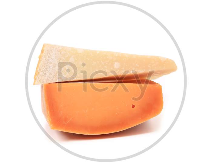 Close Up Of Two Cheese Types. Isolated On A White Background.