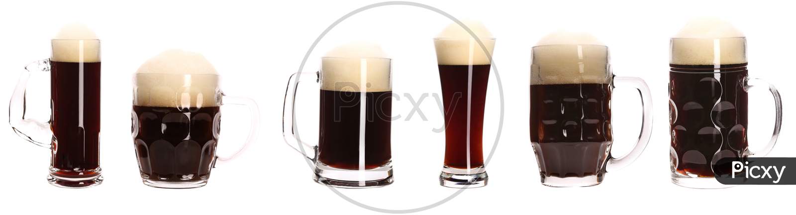 Close Up Of Various Beer Mugs. Isolated On A White Background.