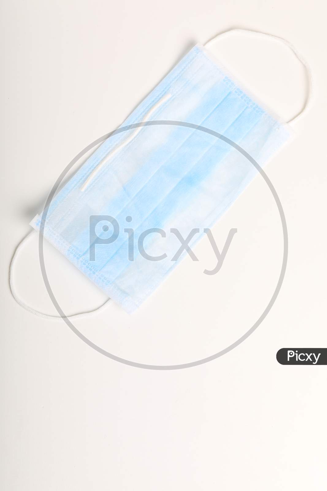 Medical Mask For Protection Against Flu And Corona Virus On White Background