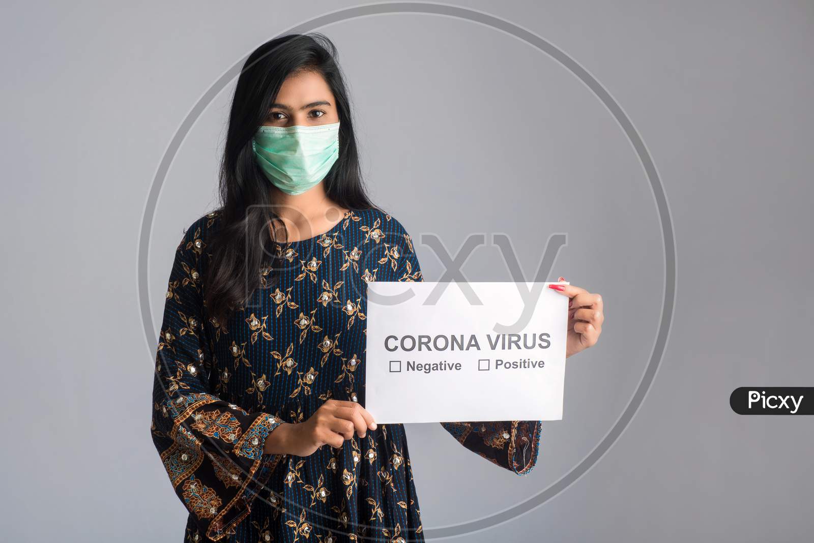 A Young Woman In A Medical Mask Holding A Board Of The Epidemic Of Coronavirus, Covid-19