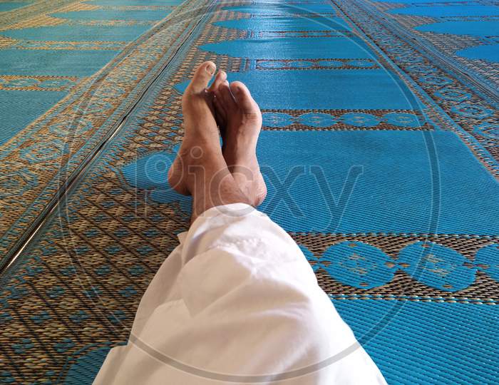 Sitting in hall of masjid