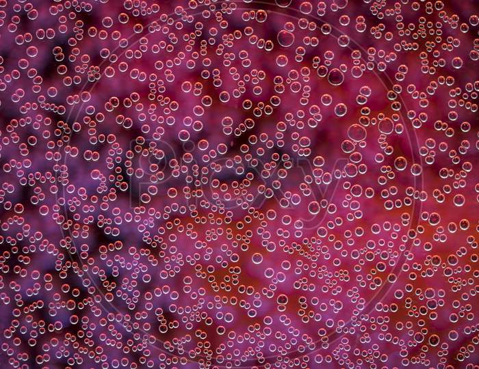 Highly Detailed Texture Of Gaseous Liquid With Sparkling Red Bubbles