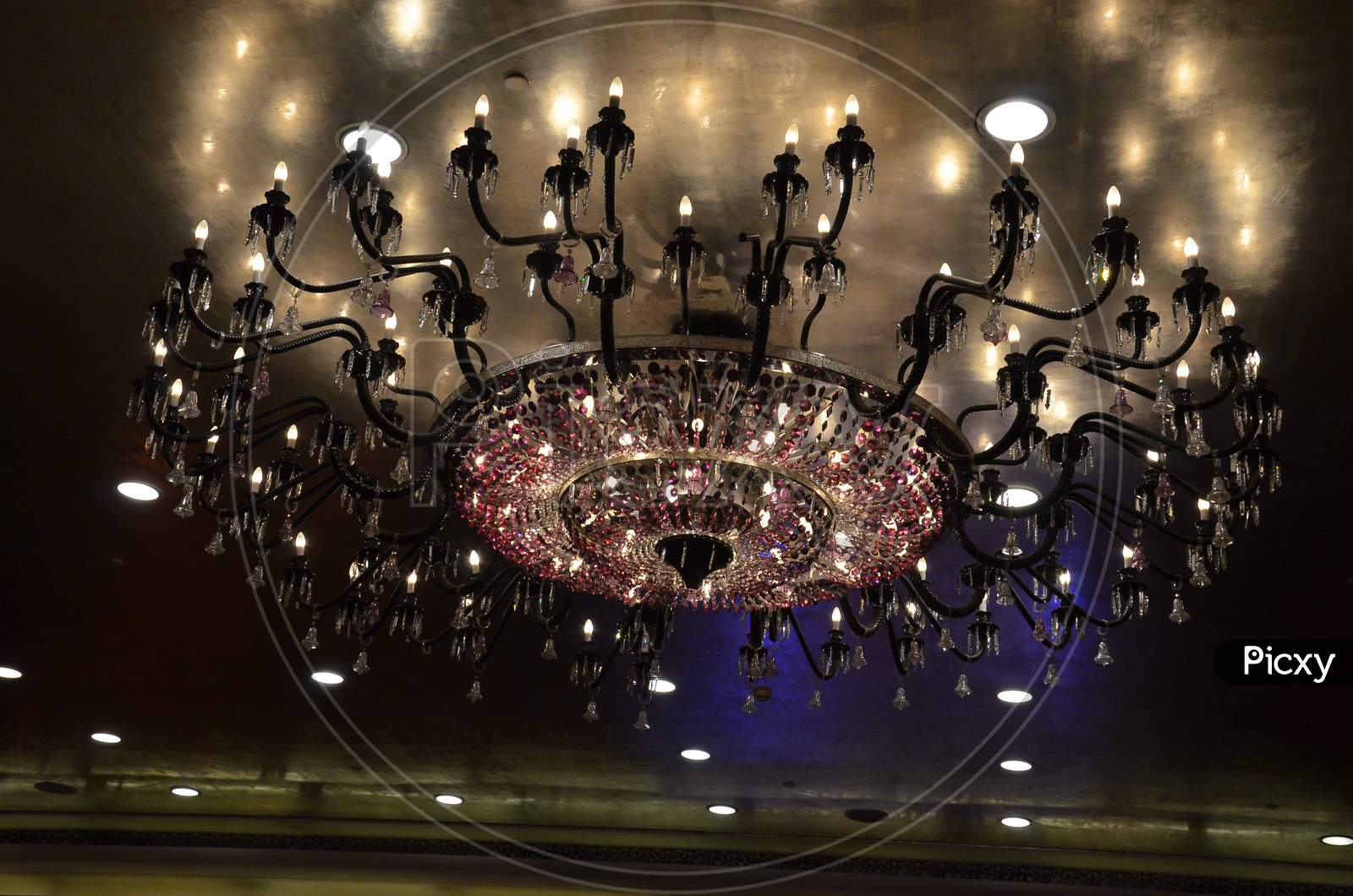 Chandelier Light Fixture To A House Ceiling