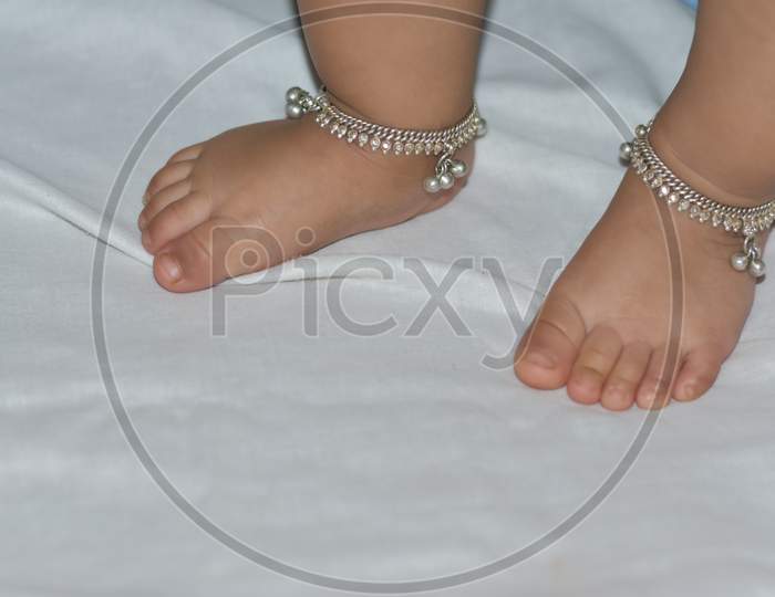 Anklet in baby feet.