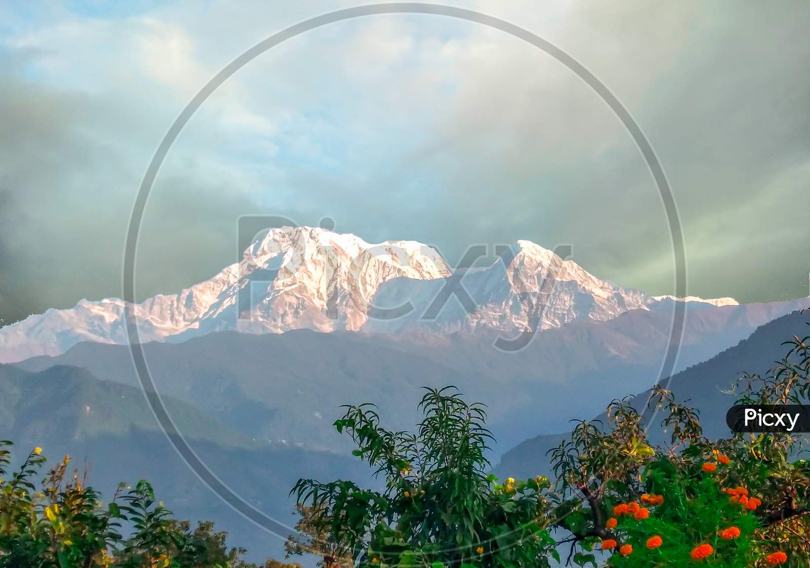 A beautiful machhapuchhre mountain with clouds of pokhara nepal. clicking at morning.