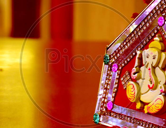 Lord Ganesh Photo Frame At an Indian Wedding Ceremony
