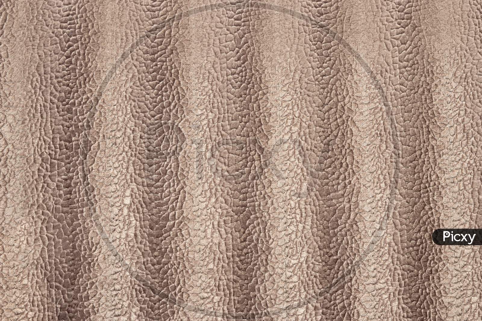 Highly Detailed Texture Of Beige Velvet Cloth With Snakeskin Patterns.