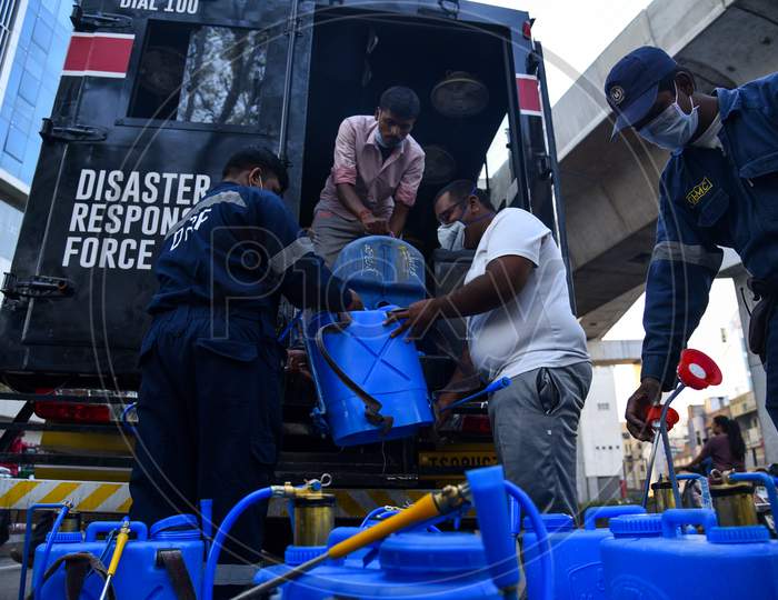 Disaster Response Force(DRF) team mixing Disinfectant Solution across the Hyderabad City to reduce the spread of the COVID-19 Virus or Coronavirus at Ameerpet Metro Station