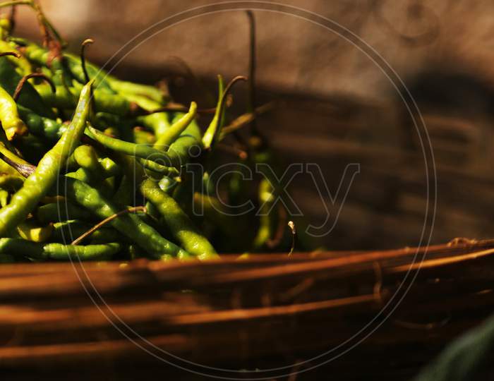 A Basket full of Green Chillies