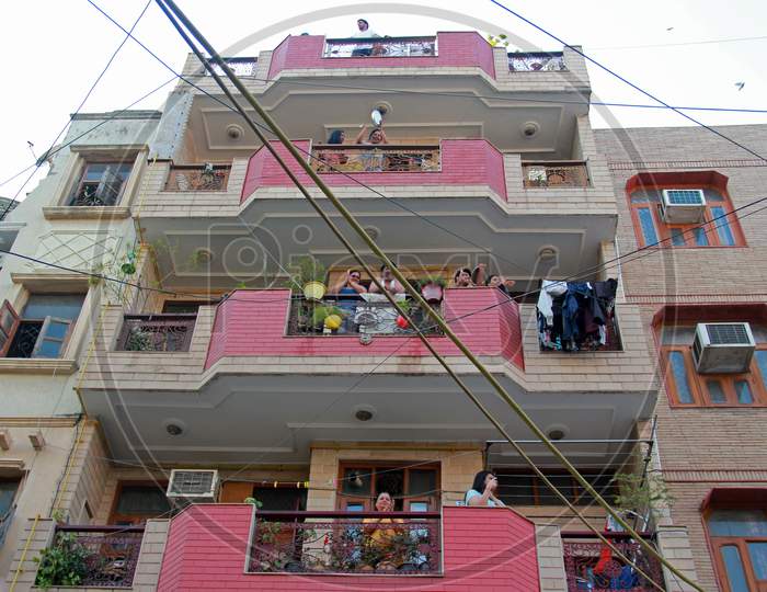 Indian People Clapping And Making Sounds From House Balconies  After Self-imposed Quarantine As PM Narendra Modi Asked For Janata Curfew , Delhi