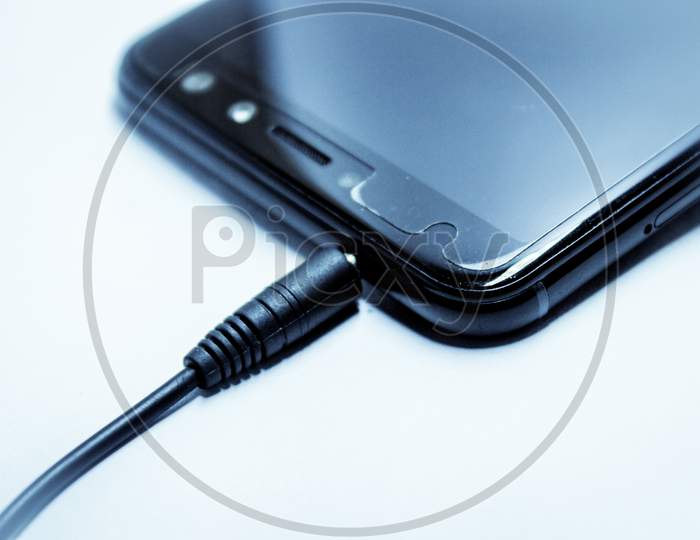 Ear Phones Connected to an Smartphone