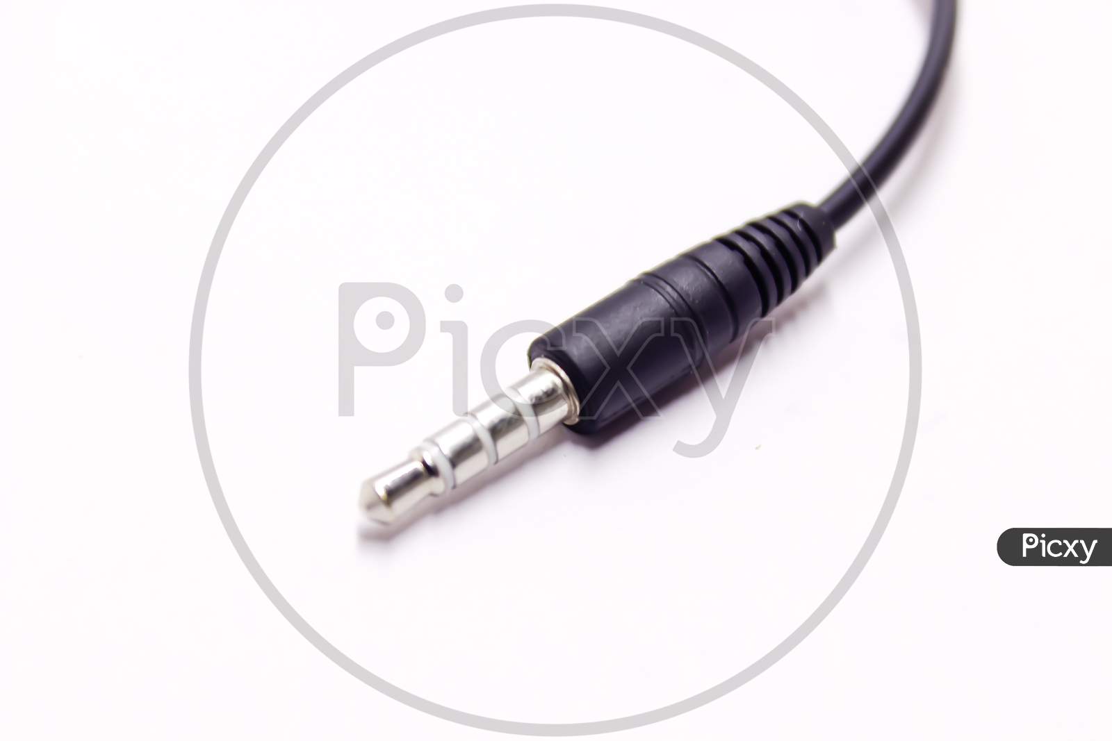 3.5mm Earphones Jack Over An Isolated White Background