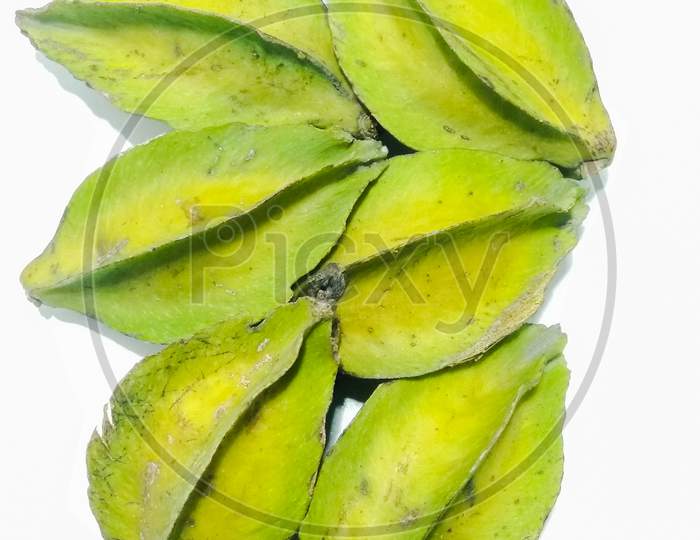 Green Star Fruit Or Carambola Fruit Over an Isolated White Background
