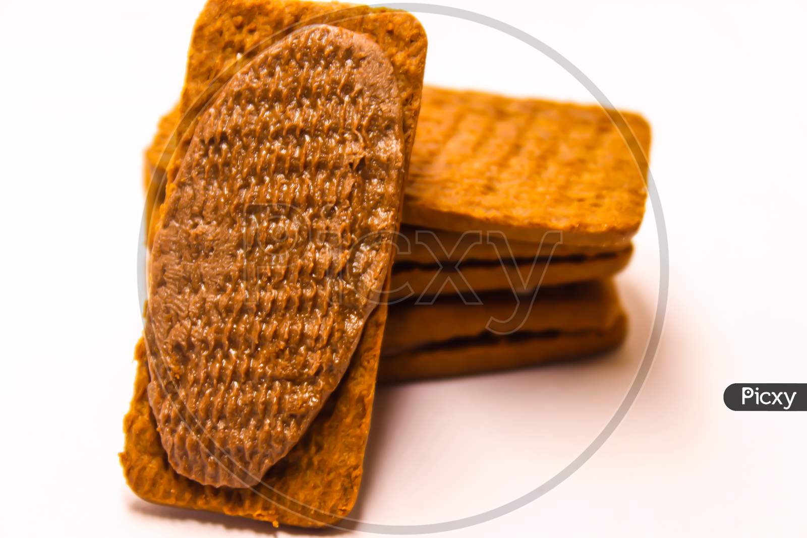 Bourbon Biscuit With Chocolate Cream Over An Isolated White Background