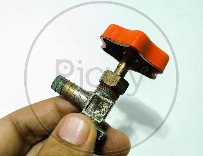 Water Pipe Valve Holding in a Hand