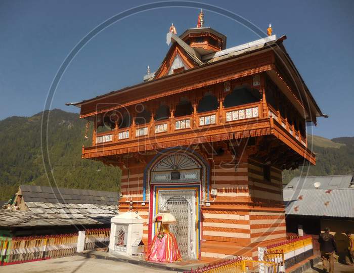 Close up view of wooden made temple in hill area of Himachal Pradesh.