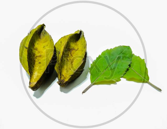 Star Fruit or Carambola Fruit With Leaf Over an Isolated White Background
