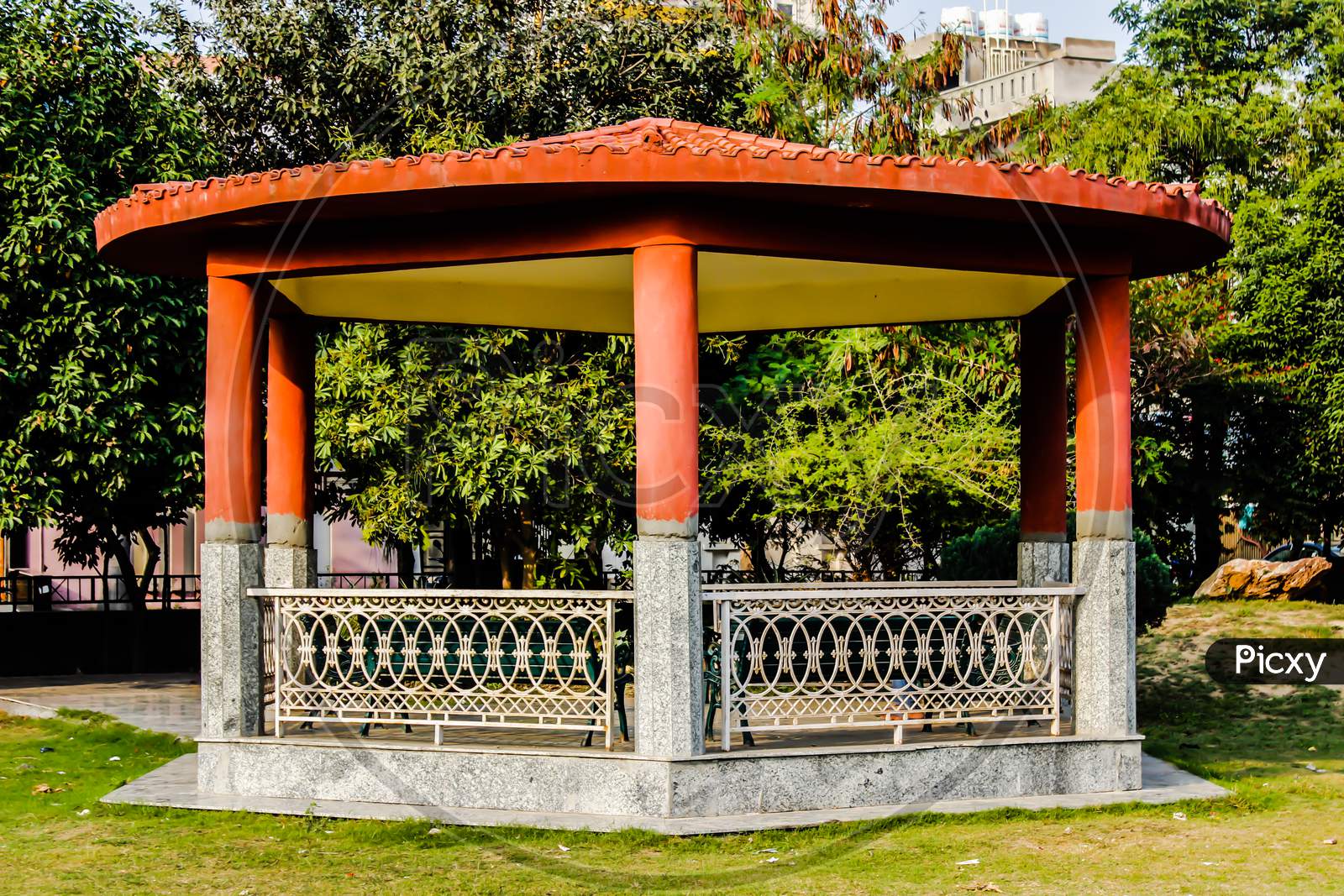 A Shelter With Benches In an Park