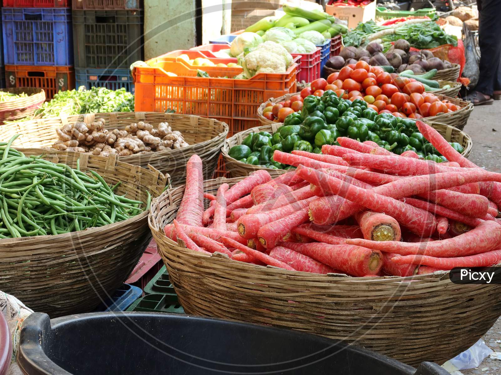 Fresh raw vegetable basket in local wholesale vegetable market.