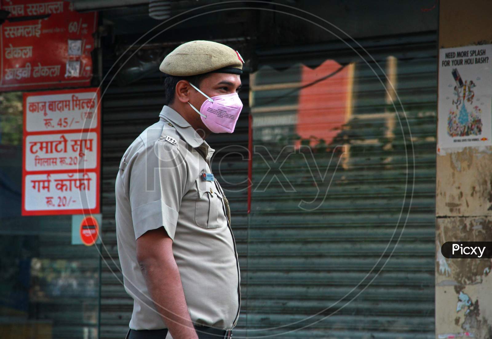 A Police Man Wearing a Safety N95 Mask  On Streets Of Delhi Amidst COVID 19 or Corona Virus Outbreak