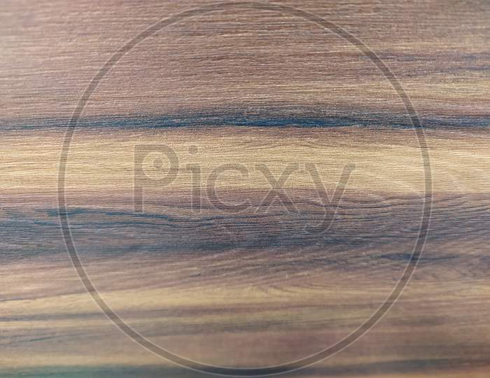 Close up view of brown colour wooden background texture.
