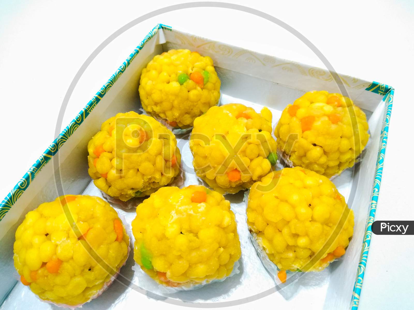 Indian Sweet Savories Laddus   On an Isolated White Background