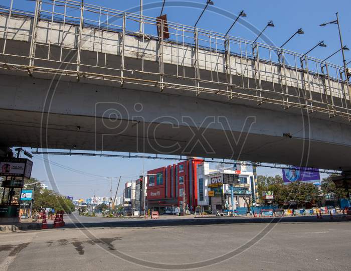 Janata Curfew , Deserted Roads At Hi-tech City Signal  in Hyderabad  As Indian Prime Minister Narendra Modi Called For a 14 Hour Janta  Curfew Or Self-imposed  Quarantine To Break The  Highly Contagious  COVID 19 Or Corona Virus Spread