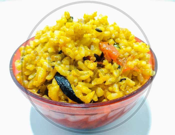 Indian Rice Recipe Kichadi Or Dal Rice In a Bowl Over an isolated White Background