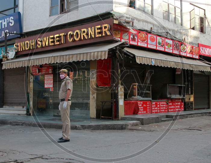 Janata Curfew, Closed Shops And Eateries At Shankar Road  in Delhi As Indian Prime Minister Narendra Modi Called For A 14 Hour Janta Curfew Or Self-Imposed Quarantine To Break The Highly Contagious Covid 19 Or Corona Virus Spread