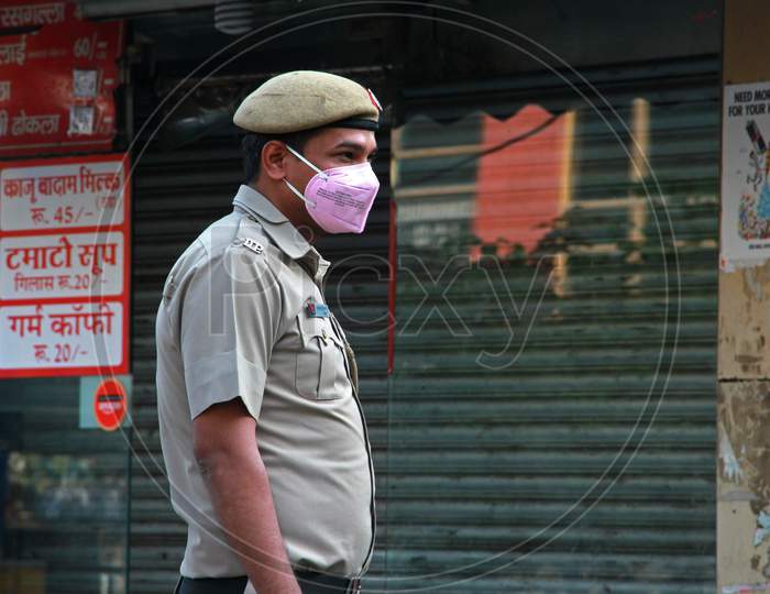 Delhi Police Man Wearing Security Mask Amidst COVID 19 Or Corona Virus Outbreak in India