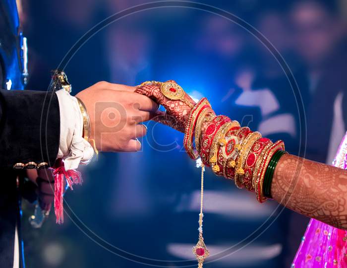 Bride & Groom Hand' Together In Indian Wedding