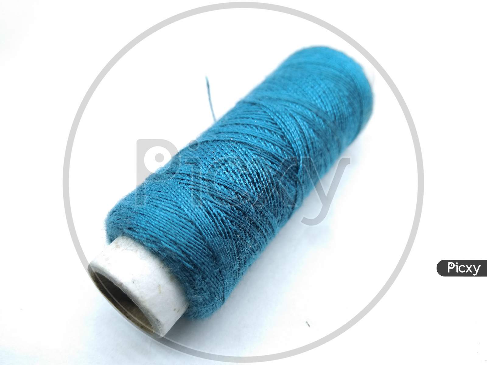 Sewing Thread Roll On Isolated White Background