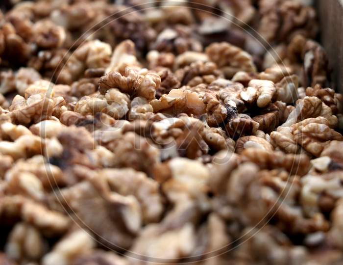 Closeup Of Big Shelled Walnuts (Akhrot) Pile Sold In Indian Market