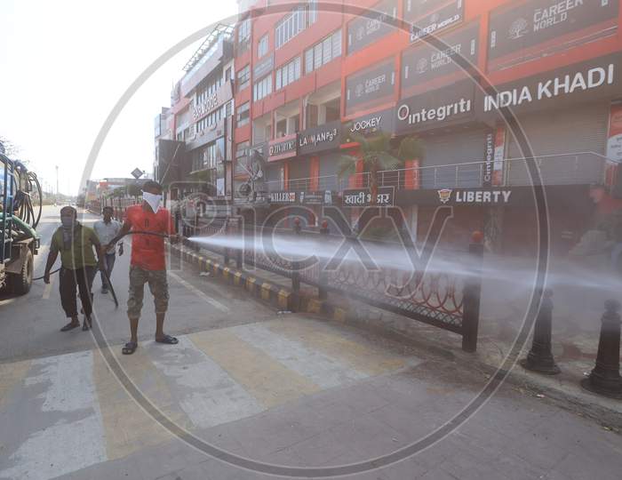 Municipal Workers Sanitizing The Roads And Streets of Prayagraj Due To  Corona Virus Or COVID 19 Outbreak