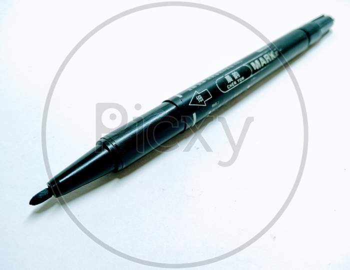 Black Sketch  Pen Or marker  Over an Isolated White Background