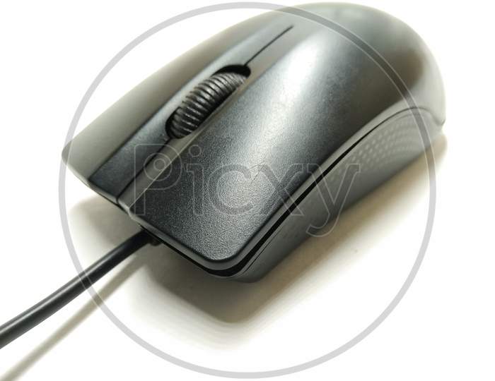Optical Mouse Of Computer Over an Isolated White Background