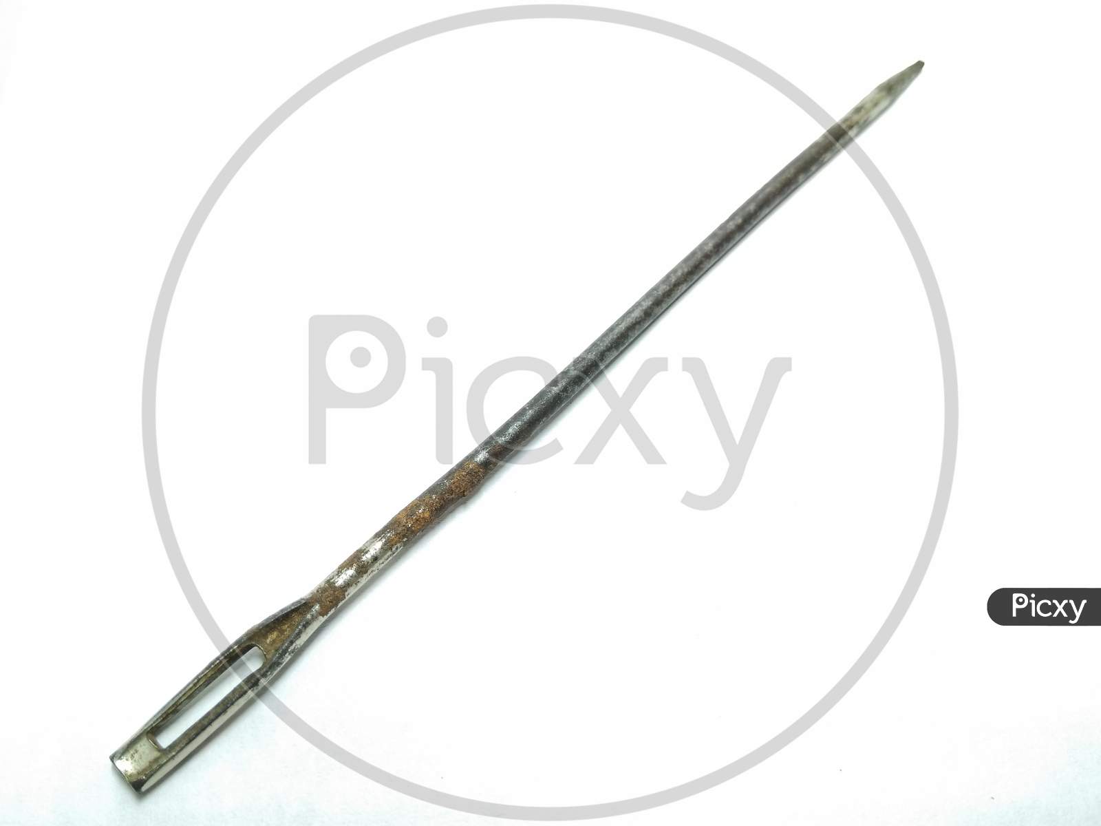 Steel Needle Or Needle Over an Isolated White