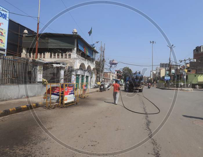 Municipal Workers Sanitizing The Roads And Streets of Prayagraj Due To  Corona Virus Or COVID 19 Outbreak