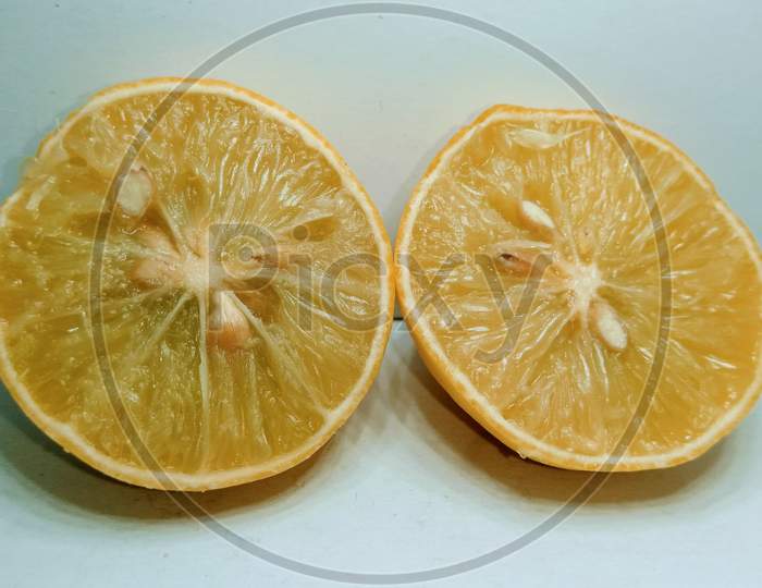 Slices of Dried Lemon on White Background