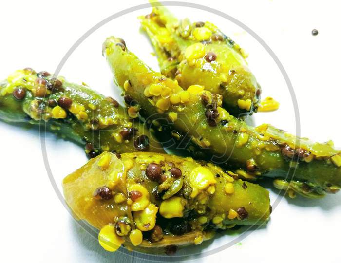 Dried Mango Pickle Over an Isolated White Background