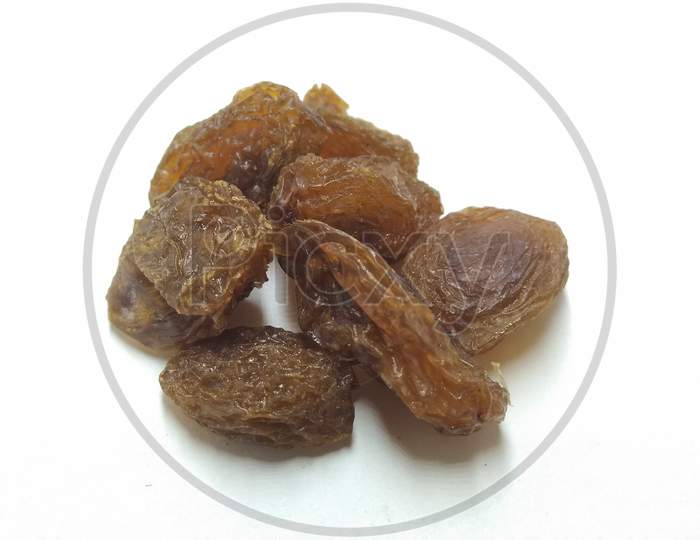 Dried Grapes Or Raisin On an White Background